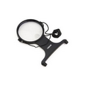 MagniFree a Hands Free, hanging 2x Magnifier with a 3.5x power bi-focal spot lens.